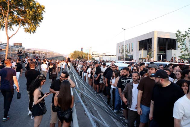 July 11, 2026, Tirane, Albania, ALB: People wait in line ahead of a concert by U.S. rapper Kanye West, also known as Ye, in Tirana, Albania, on July 11, 2026. The controversial decision of Albanian Prime Minister Edi Rama to allocate 4 million euros of emergency budget funds to purchase unsold tickets Ã’to save Albanias faceO has been contested and ridiculed as out of touch by protestors who have been demanding his resignation for over a month. Tirane ALB  - ZUMAs337 20260711_znp_s337_010 Copyright: xGentxShkullakux