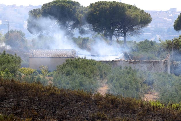Wildfires continue on the Italian island of Sicily PALERMO, ITALY - JULY 11: Italian firefighters battle a wildfire that broke out in a maquis-shrubland area near the Partinico municipality of Palermo in Sicily, Italy on July 11, 2026. Firefighting teams intervened with ground crews, water-discharging aircraft, and helicopters to bring the blaze under control. Alberto Lo Bianco Anadolu Palermo Italy. Editorial use only. Please get in touch for any other usage.  Copyright: x2026xAnadoluxAlbertoxLoxBiancox