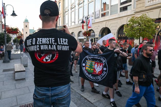 Poland Commemorates 83rd Anniversary Of Volhynia Genocide RZESZOW, POLAND - JULY 11: A participant wearing a T-shirt reading The victims cry out not for vengeance, but for remembrance films a silent march organized by nationalist groups including Oboz Narodowo-Radykalny (ONR) during a solemn commemoration on July 11, 2026, in Rzeszow, Poland. The march marks the 83rd anniversary of Bloody Sunday to honor over 100,000 Polish civilians tortured and murdered by the Ukrainian Insurgent Army (UPA) and the Organization of Ukrainian Nationalists (OUN-B) across Volhynia and Eastern Galicia between 1943 and 1947. Rzeszow Poland  Copyright: xArturxWidakx originalFilename: widak-polandma260711_npqGS.jpg