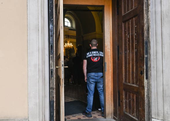 Poland Commemorates 83rd Anniversary Of Volhynia Genocide RZESZOW, POLAND - JULY 11: A man stands in the entrance doorway of a church during a solemn commemorative mass held prior to the march on July 11, 2026, in Rzeszow, Poland. His T-shirt features a quote regarding the massacres: Nie o zemste, lecz o pamiec wolaja ofiary (The victims cry out not for vengeance, but for remembrance). The mass was part of Rzeszow commemorations marking the 83rd anniversary of Bloody Sunday, honoring over 100,000 Polish civilians tortured and murdered by the Ukrainian Insurgent Army (UPA) and the Organization of Ukrainian Nationalists (OUN-B) across Volhynia and Eastern Galicia between 1943 and 1947. Rzeszow Poland  Copyright: xArturxWidakx originalFilename: widak-polandma260711_npWmS.jpg