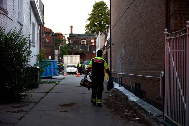 July 11, 2026, Toronto, On, Canada: A paramedic walks towards the scene of a shooting at the Salsa on St. Clair event in Toronto, on Saturday, July 11, 2026. Toronto Canada  - ZUMAc35_ 20260711_zaf_c35_015 Copyright: xKeitoxNewmanx