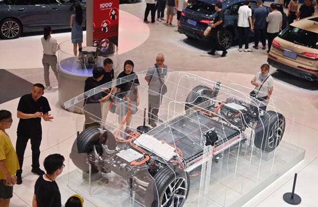 CHANGCHUN, CHINA - JULY 11: People view a car chassis during the 23rd Changchun International Automobile Expo on July 11, 2026 in Changchun, Jilin Province of China. The exhibition drew participation from 53 Chinese and foreign automobile manufacturers, with over a thousand vehicles on display.  Copyright: xChinaxNewsxServicex 111653661059
