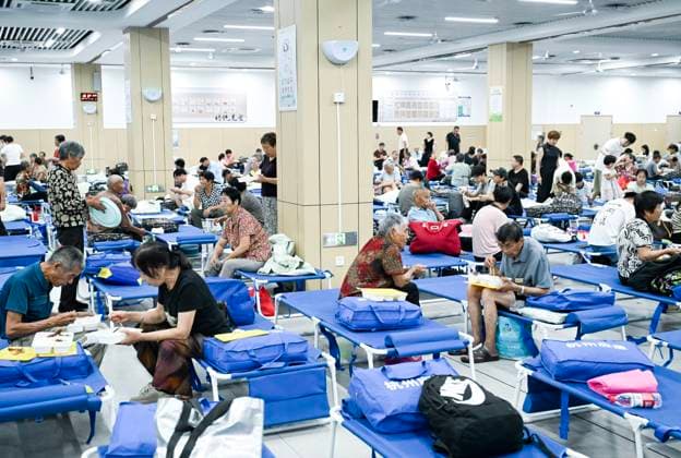 HANGZHOU, CHINA - JULY 11: Villagers are evacuated to a primary school as Typhoon Bavi approaches on July 11, 2026 in Hangzhou, Zhejiang Province of China. Typhoon Bavi, the ninth typhoon of the year, is expected to make landfall along the coast between Wenling and Rui an in east China s Zhejiang Province from the night of July 11 to early morning of July 12, according to the National Meteorological Center.  Copyright: xVCGx 111653694216