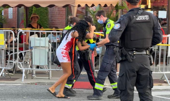 July 11, 2026, Toronto, On, Canada: Police and paramedics tend to a victim of a shooting at the Salsa on St. Clair event in Toronto, on Saturday, July 11, 2026. Toronto Canada  - ZUMAc35_ 20260711_zaf_c35_059 Copyright: xJacobxEstrinx