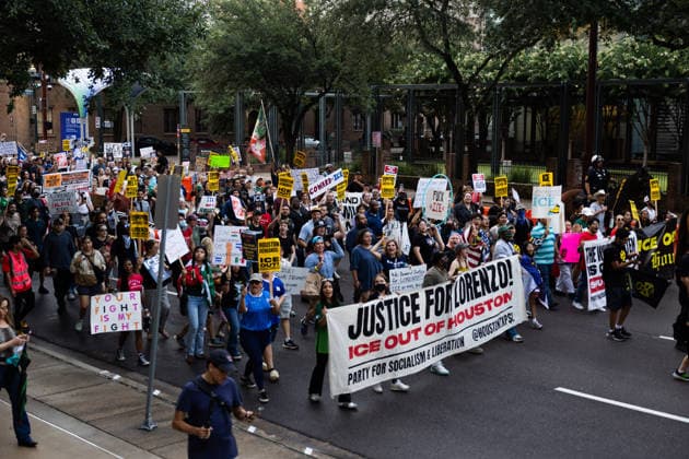 July 11, 2026, Houston, Texas, USA: Protesters march in front of the Federal Detention Center in Downtown Houston to protest against U.S. Immigration and Customs Enforcement (ICE) after Lorenzo Salgado Araujo was fatally shot by an ICE agent during an attempted immigration enforcement operation, an incident that has prompted calls from community leaders and elected officials for an independent investigation, Saturday, July 11, in Houston, Texas. Houston USA  - ZUMAg287 20260711_zsp_g287_007 Copyright: xMatthewxGuzmanx