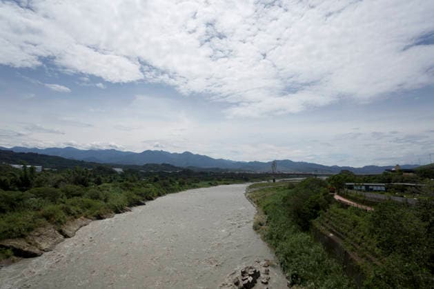 July 12, 2026, Taichung, Taiwan: The Dajia River flows rapidly in Taichung, Taiwan. The Central Weather Administration (CWA) lifted its land and sea warnings for Typhoon Bavi on Sunday morning as the storm weakened and moved away from Taiwan, after bringing heavy rain and strong winds to parts of the country. Taichung Taiwan  - ZUMAc217 20260712_zip_c217_006 Copyright: xAndrexM.xChangx