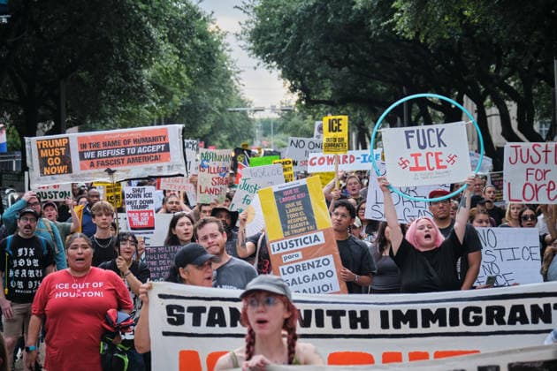 July 11, 2026, Houston, Texas, USA: Demonstrators march from Houston City Hall through downtown on July 11, 2026, demanding an independent investigation into the death of Lorenzo Salgado Araujo, a 52-year-old Mexican national fatally shot by a U.S. Immigration and Customs Enforcement agent in Houston on July 7. The protest was organized by the Party for Socialism and Liberation Ã¢â‚¬ Houston. Houston USA  - ZUMAe130 20260711_znp_e130_015 Copyright: xCarlosxEscalonax