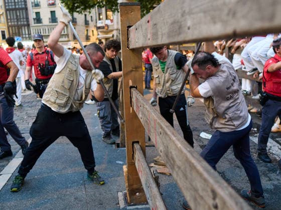 Sixth running of the bulls during the 2026 San Fermín Festival, featuring bulls from the La Palmosilla ranch; carpenters setting up the fencing before the sixth running of the bulls during the 2026 San Fermín Festival, on July 12, 2026, in Pamplona, Navarre, Spain. This year, bulls from the La Palmosilla ranch will headline the sixth running of the San Fermín Festival in Spain.  Copyright: xEduardoxSanzx 7660350
