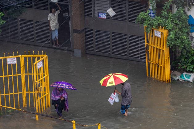 Monsoon downpour made travel slow and dangerous in Dhaka - 12 Jul 2026 People struggle to walk through a waterlogged street following heavy rains causing much suffering for pedestrians and commuters. Monsoon downpour made travel slow and dangerous. Dhaka Bangladesh Copyright: xSazzadxHossainx xSOPAxImagesx Photo_Sazzad Hossain_Monsoon rain (12)