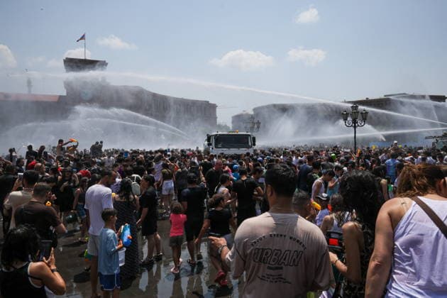 ARMENIA, YEREVAN - JULY 12, 2026: Tank trucks pour water over citizens in Republic Square during the traditional feast of Vardavar celebrated by the Armenian Apostolic Church to mark the Transfiguration of Christ Yerevan Armenia  - ZUMAt113 20260712_zaa_t113_130 Copyright: xAlexanderxPatrinx