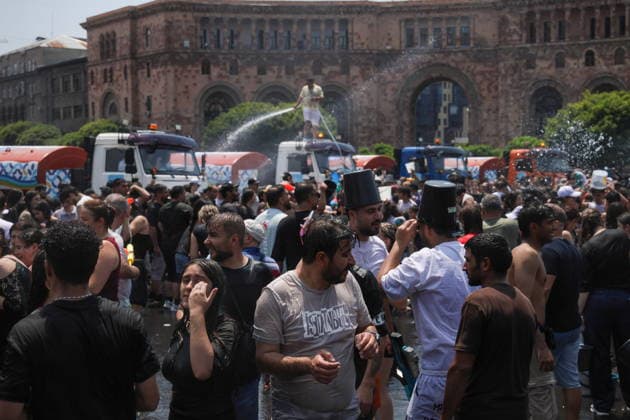 ARMENIA, YEREVAN - JULY 12, 2026: Tank trucks pour water over citizens in Republic Square during the traditional feast of Vardavar celebrated by the Armenian Apostolic Church to mark the Transfiguration of Christ Yerevan Armenia  - ZUMAt113 20260712_zaa_t113_134 Copyright: xAlexanderxPatrinx