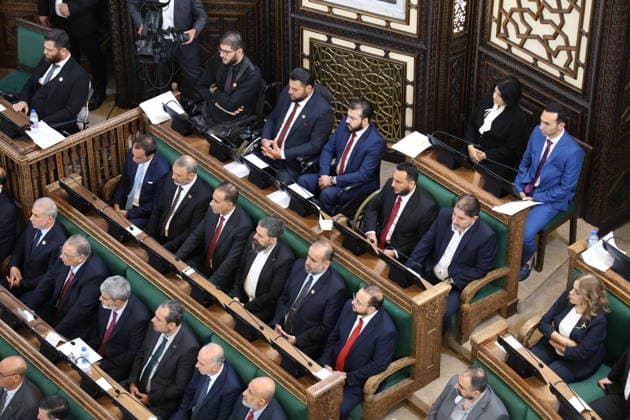 Syria s New Parliament Holds Historic Inaugural Session Damascus, Syria - July 12, 2026: Members of Syria s newly formed People s Assembly attend the body s inaugural session in Damascus representing the first parliament convention since the end of the rule of ousted Syrian President Bashar al-Assad. Damascus Syria Copyright: xMohammadxBashirxAldaherx