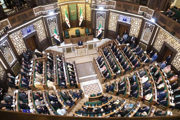 Syria s New Parliament Holds Historic Inaugural Session Damascus, Syria - July 12, 2026: Syrian President Ahmed al-Sharaa speaks during the inaugural session of Syria s newly formed People s Assembly which marks the historic first parliament session held in Damascus since the ousting of former President Bashar al-Assad. Damascus Syria Copyright: xMohammadxBashirxAldaherx
