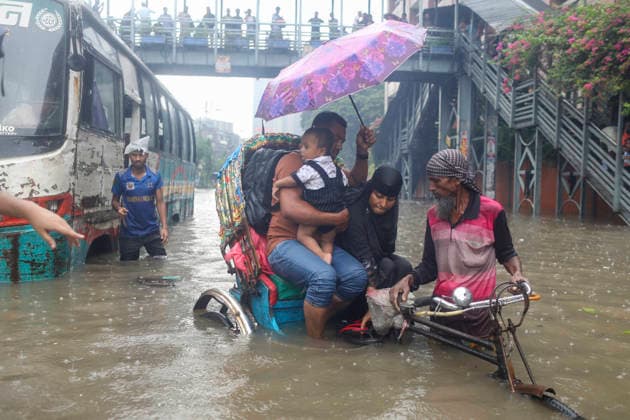 July 12, 2026, Dhaka, Dhaka, Bangladesh: Continuous rainfall submerged many roads in Dhaka under severe waterlogging on July 12, 2026. With rain continuing across the country, authorities warned that the situation could deteriorate further. The persistent downpours have also triggered flooding in several regions of Bangladesh. According to the latest reports, at least 51 people have died as a result of the floods. Dhaka Bangladesh  - ZUMAj163 20260712_zip_j163_015 Copyright: xAbuxSufianxJewelx