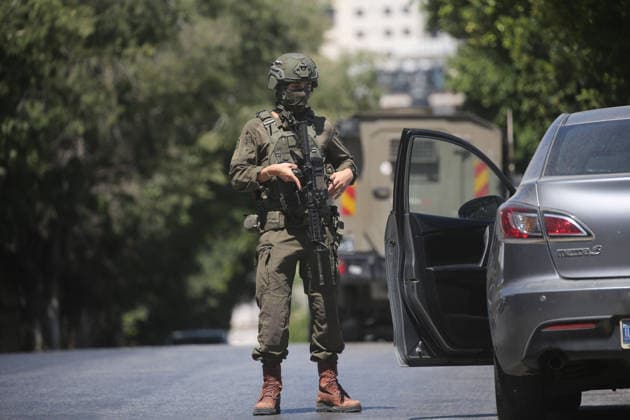 Israeli forces deploy during military operation in Nablus Israeli military vehicles and soldiers are deployed in the streets during a military operation targeting the West Bank city of Nablus, on July 12, 2026. Israeli forces raided several neighborhoods in the western part of the city during the operation. Photo by Mohammed Nasser apaimages Nablus West Bank Palestinian Territory 120726_Nablus_MN_00(1) Copyright: xapaimagesxMohammedxNasserx xapaimagesx
