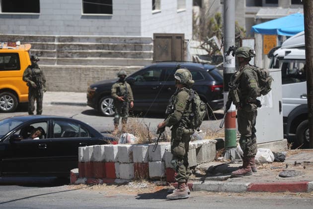 Israeli forces deploy during military operation in Nablus Israeli military vehicles and soldiers are deployed in the streets during a military operation targeting the West Bank city of Nablus, on July 12, 2026. Israeli forces raided several neighborhoods in the western part of the city during the operation. Photo by Mohammed Nasser apaimages Nablus West Bank Palestinian Territory 120726_Nablus_MN_00(2) Copyright: xapaimagesxMohammedxNasserx xapaimagesx