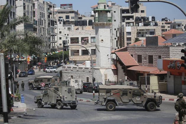 Israeli forces deploy during military operation in Nablus Israeli military vehicles and soldiers are deployed in the streets during a military operation targeting the West Bank city of Nablus, on July 12, 2026. Israeli forces raided several neighborhoods in the western part of the city during the operation. Photo by Mohammed Nasser apaimages Nablus West Bank Palestinian Territory 120726_Nablus_MN_00(4) Copyright: xapaimagesxMohammedxNasserx xapaimagesx