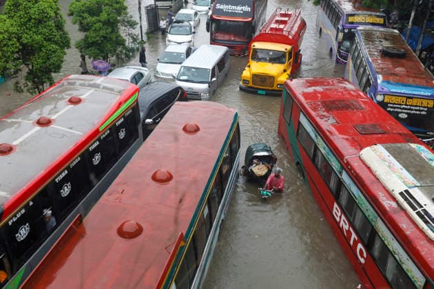 July 12, 2026, Dhaka, Dhaka, Bangladesh: Continuous rainfall submerged many roads in Dhaka under severe waterlogging on July 12, 2026. With rain continuing across the country, authorities warned that the situation could deteriorate further. The persistent downpours have also triggered flooding in several regions of Bangladesh. According to the latest reports, at least 51 people have died as a result of the floods. Dhaka Bangladesh - ZUMAj163 20260712_zip_j163_010 Copyright: xAbuxSufianxJewelx