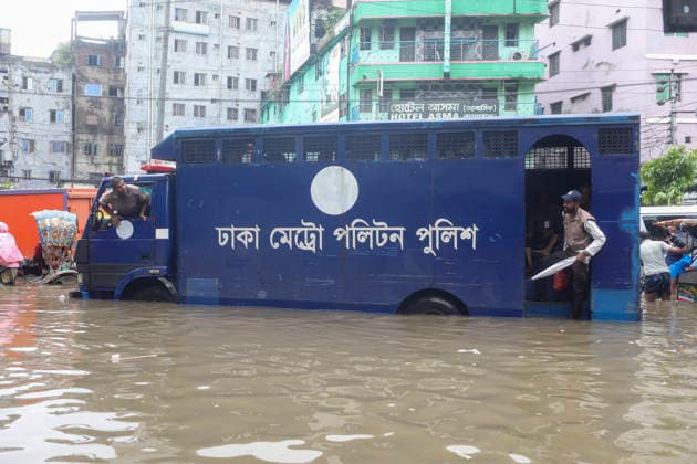July 12, 2026, Dhaka, Dhaka, Bangladesh: Continuous rainfall submerged many roads in Dhaka under severe waterlogging on July 12, 2026. With rain continuing across the country, authorities warned that the situation could deteriorate further. The persistent downpours have also triggered flooding in several regions of Bangladesh. According to the latest reports, at least 51 people have died as a result of the floods. Dhaka Bangladesh  - ZUMAj163 20260712_zip_j163_024 Copyright: xAbuxSufianxJewelx
