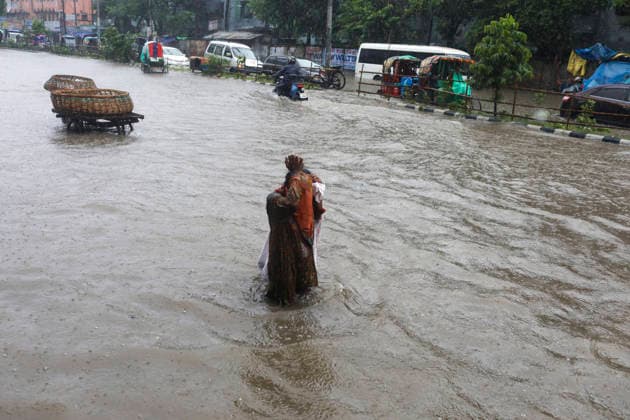 July 12, 2026, Dhaka, Dhaka, Bangladesh: Continuous rainfall submerged many roads in Dhaka under severe waterlogging on July 12, 2026. With rain continuing across the country, authorities warned that the situation could deteriorate further. The persistent downpours have also triggered flooding in several regions of Bangladesh. According to the latest reports, at least 51 people have died as a result of the floods. Dhaka Bangladesh  - ZUMAj163 20260712_zip_j163_047 Copyright: xAbuxSufianxJewelx