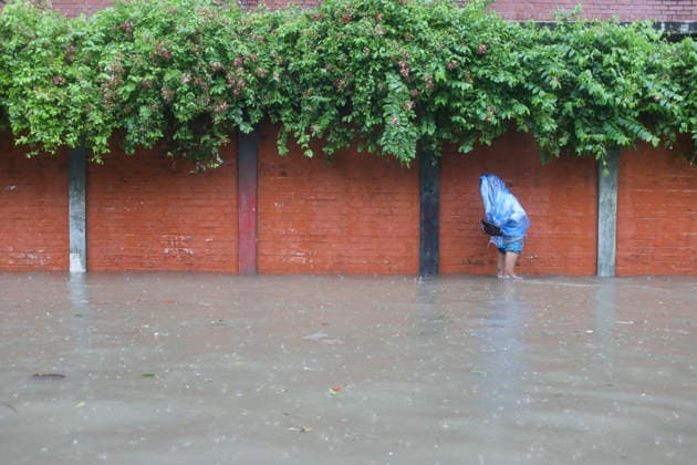 July 12, 2026, Dhaka, Dhaka, Bangladesh: Continuous rainfall submerged many roads in Dhaka under severe waterlogging on July 12, 2026. With rain continuing across the country, authorities warned that the situation could deteriorate further. The persistent downpours have also triggered flooding in several regions of Bangladesh. According to the latest reports, at least 51 people have died as a result of the floods. Dhaka Bangladesh  - ZUMAj163 20260712_zip_j163_065 Copyright: xAbuxSufianxJewelx