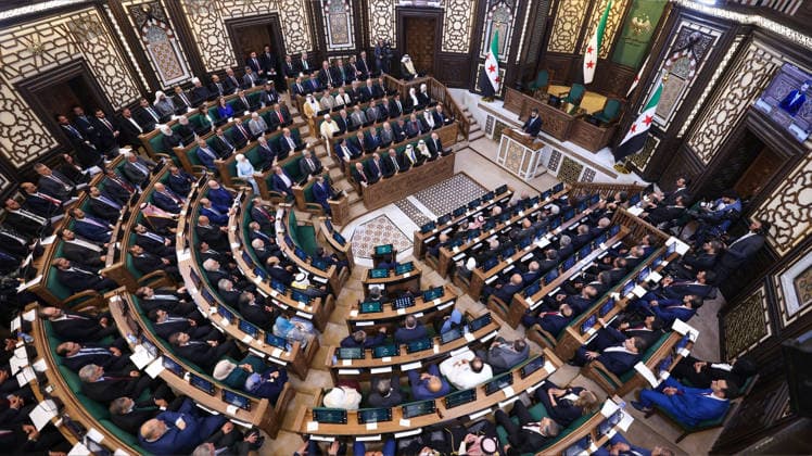 First parliamentary session held in post-Assad Syria led by President Ahmed Shara DAMASCUS, SYRIA - JULY 12: (----EDITORIAL USE ONLY - MANDATORY CREDIT - SYRIAN PRESIDENCY HANDOUT - NO MARKETING NO ADVERTISING CAMPAIGNS - DISTRIBUTED AS A SERVICE TO CLIENTS----) Syrian President Ahmed Shara addresses the People s Assembly during its first parliamentary session following the fall of the Assad regime, in Damascus, Syria, on July 12, 2026. In his speech, Shara emphasized that Syria is writing a new history that reflects its civilization, values, and heritage, and called for opening a new page together to build a modern Syria. Syrian Presidency Handout Anadolu Damascus Syria. Editorial use only. Please get in touch for any other usage.  Copyright: x2026xAnadoluxSyrianxPresidencyx xHandoutx