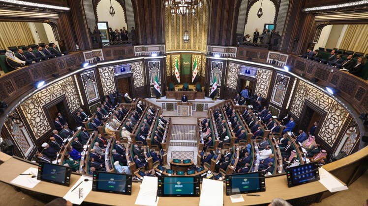 First parliamentary session held in post-Assad Syria led by President Ahmed Shara DAMASCUS, SYRIA - JULY 12: (----EDITORIAL USE ONLY - MANDATORY CREDIT - SYRIAN PRESIDENCY HANDOUT - NO MARKETING NO ADVERTISING CAMPAIGNS - DISTRIBUTED AS A SERVICE TO CLIENTS----) Syrian President Ahmed Shara addresses the People s Assembly during its first parliamentary session following the fall of the Assad regime, in Damascus, Syria, on July 12, 2026. In his speech, Shara emphasized that Syria is writing a new history that reflects its civilization, values, and heritage, and called for opening a new page together to build a modern Syria. Syrian Presidency Handout Anadolu Damascus Syria. Editorial use only. Please get in touch for any other usage.  Copyright: x2026xAnadoluxSyrianxPresidencyx xHandoutx