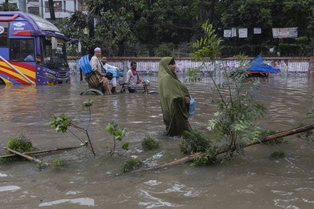 Persistent rain leaves Dhaka waterlogged, disrupting daily life DHAKA, BANGLADESH - JULY 12: Continuous heavy rainfall over the past several days has caused widespread waterlogging across different parts of the capital, Dhaka, Bangladesh on July 12, 2026. Flooded roads, residential neighborhoods, and commercial areas have disrupted the daily lives of residents, with day laborers, pedestrians, schoolchildren, and families among those most affected. Waterlogged streets have severely hampered the movement of private vehicles and other transport, while the ground floors and entrances of many buildings have been inundated. Stray dogs have also struggled to navigate the flooded streets. The prolonged rainfall has significantly disrupted normal li  Copyright: x2026xAnadoluxAbdulxGonix