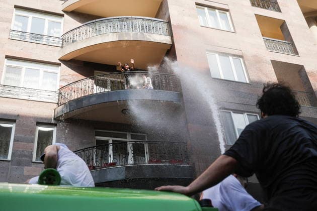 ARMENIA, YEREVAN - JULY 12, 2026: Citizens enjoy dousing each other during the traditional feast of Vardavar celebrated by the Armenian Apostolic Church to mark the Transfiguration of Christ. Alexander Patrin TASS  94974771