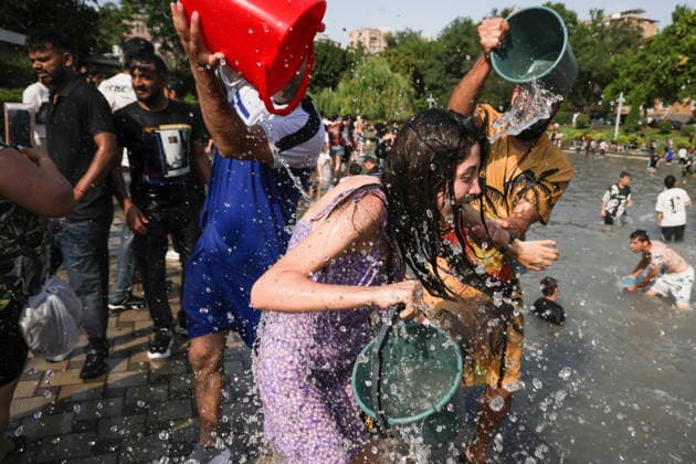 ARMENIA, YEREVAN - JULY 12, 2026: Citizens enjoy dousing each other during the traditional feast of Vardavar celebrated by the Armenian Apostolic Church to mark the Transfiguration of Christ Yerevan Armenia  - ZUMAt113 20260712_zaa_t113_270 Copyright: xAlexanderxPatrinx