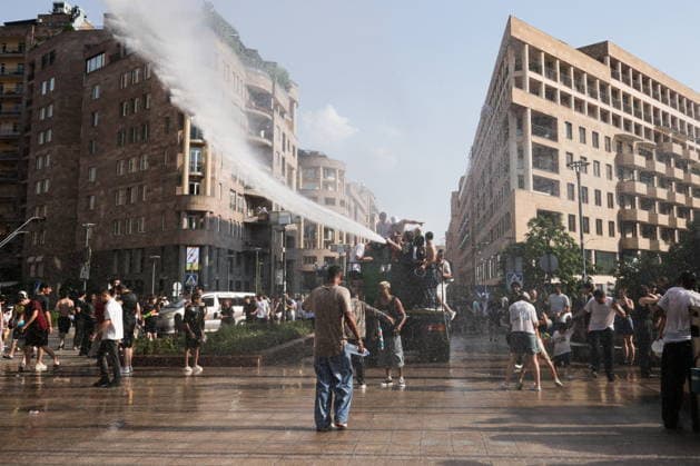 ARMENIA, YEREVAN - JULY 12, 2026: Citizens enjoy dousing each other during the traditional feast of Vardavar celebrated by the Armenian Apostolic Church to mark the Transfiguration of Christ Yerevan Armenia  - ZUMAt113 20260712_zaa_t113_271 Copyright: xAlexanderxPatrinx