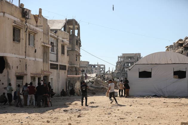 Palestinians seek shelter during Israeli airstrike in Gaza City Palestinians attempt to take cover from a massive explosion following an Israeli airstrike targeting a blacksmith workshop in the al-Sabra neighborhood of Gaza City, on July 12, 2026. Photo by Belal Osama apaimages Gaza Gaza Strip Palestinian Territory 120726_Gaza_BO_3_00(1) Copyright: xapaimagesxBelalxOsamax xapaimagesx