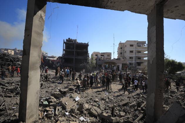Israeli attacks on Gaza continue in violation of the ceasefire GAZA CITY, GAZA, PALESTINE - JULY 12: Palestinians inspect the widespread destruction in the area caused by an unmanned aerial vehicle (UAV) strike where the Israeli army targeted several buildings with an UAV on Industrial Street in western Gaza City, Gaza, Palestine, on July 12, 2026. Khames Alrefi Anadolu Gaza City Gaza. Editorial use only. Please get in touch for any other usage.  Copyright: x2026xAnadoluxKhamesxAlrefix