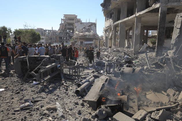Israeli attacks on Gaza continue in violation of the ceasefire GAZA CITY, GAZA, PALESTINE - JULY 12: Palestinians inspect the widespread destruction in the area caused by an unmanned aerial vehicle (UAV) strike where the Israeli army targeted several buildings with an UAV on Industrial Street in western Gaza City, Gaza, Palestine, on July 12, 2026. Khames Alrefi Anadolu Gaza City Gaza. Editorial use only. Please get in touch for any other usage.  Copyright: x2026xAnadoluxKhamesxAlrefix