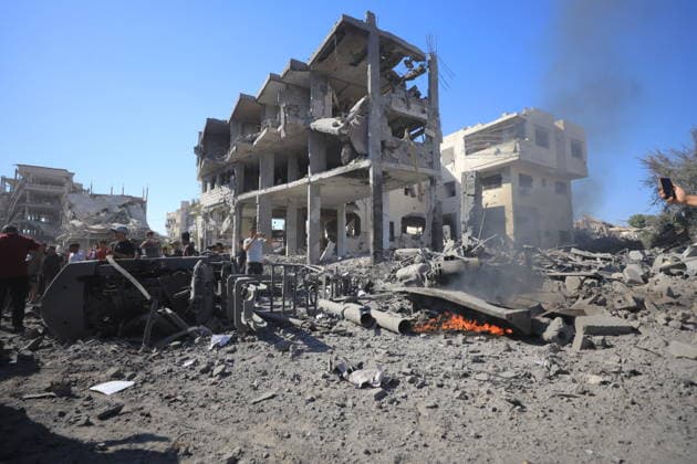 Israeli attacks on Gaza continue in violation of the ceasefire GAZA CITY, GAZA, PALESTINE - JULY 12: Palestinians inspect the widespread destruction in the area caused by an unmanned aerial vehicle (UAV) strike where the Israeli army targeted several buildings with an UAV on Industrial Street in western Gaza City, Gaza, Palestine, on July 12, 2026. Khames Alrefi Anadolu Gaza City Gaza. Editorial use only. Please get in touch for any other usage.  Copyright: x2026xAnadoluxKhamesxAlrefix