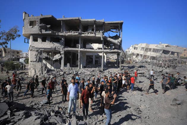 Israeli attacks on Gaza continue in violation of the ceasefire GAZA CITY, GAZA, PALESTINE - JULY 12: Palestinians inspect the widespread destruction in the area caused by an unmanned aerial vehicle (UAV) strike where the Israeli army targeted several buildings with an UAV on Industrial Street in western Gaza City, Gaza, Palestine, on July 12, 2026. Khames Alrefi Anadolu Gaza City Gaza. Editorial use only. Please get in touch for any other usage.  Copyright: x2026xAnadoluxKhamesxAlrefix