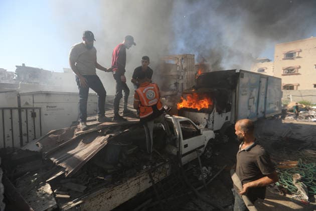 Palestinians inspect damage after Israeli airstrike in Gaza City Palestinians inspect the damage at the site of an Israeli airstrike that targeted a blacksmith workshop in the al-Sabra neighborhood of Gaza City, on July 12, 2026, as Civil Defense firefighters attempts to extinguish a fire that broke out in nearby vehicles and residential buildings following the strike. Photo by Belal Osama apaimages Gaza Gaza Strip Palestinian Territory 120726_Gaza_BO_4_00(41) Copyright: xapaimagesxBelalxOsamax xapaimagesx