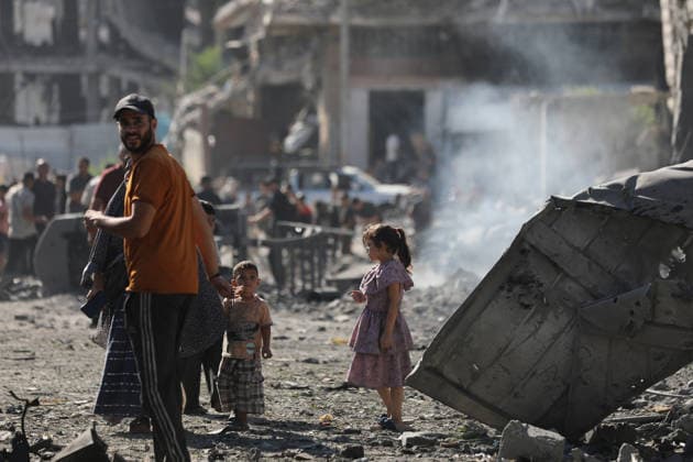 Palestinians inspect damage after Israeli airstrike in Gaza City Palestinians inspect the damage at the site of an Israeli airstrike that targeted a blacksmith workshop in the al-Sabra neighborhood of Gaza City, on July 12, 2026, as Civil Defense firefighters attempts to extinguish a fire that broke out in nearby vehicles and residential buildings following the strike. Photo by Belal Osama apaimages Gaza Gaza Strip Palestinian Territory 120726_Gaza_BO_4_00(36) Copyright: xapaimagesxBelalxOsamax xapaimagesx