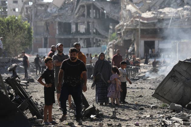 Palestinians inspect damage after Israeli airstrike in Gaza City Palestinians inspect the damage at the site of an Israeli airstrike that targeted a blacksmith workshop in the al-Sabra neighborhood of Gaza City, on July 12, 2026, as Civil Defense firefighters attempts to extinguish a fire that broke out in nearby vehicles and residential buildings following the strike. Photo by Belal Osama apaimages Gaza Gaza Strip Palestinian Territory 120726_Gaza_BO_4_00(38) Copyright: xapaimagesxBelalxOsamax xapaimagesx