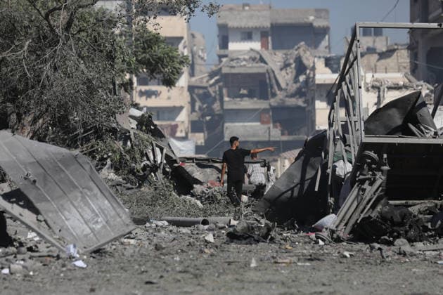 Palestinians inspect damage after Israeli airstrike in Gaza City Palestinians inspect the damage at the site of an Israeli airstrike that targeted a blacksmith workshop in the al-Sabra neighborhood of Gaza City, on July 12, 2026, as Civil Defense firefighters attempts to extinguish a fire that broke out in nearby vehicles and residential buildings following the strike. Photo by Belal Osama apaimages Gaza Gaza Strip Palestinian Territory 120726_Gaza_BO_4_00(22) Copyright: xapaimagesxBelalxOsamax xapaimagesx