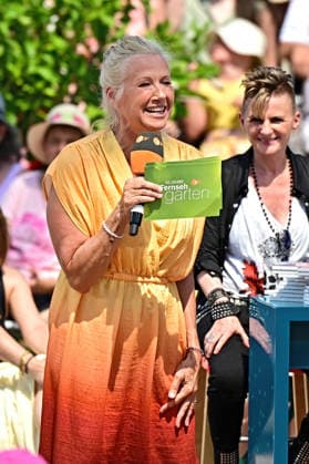 ZDF - Fernsehgarten. Fernsehmoderatorin Andrea Kiwi Kiewel während der ZDF - Unterhaltungsshow Fernsehgarten am 12.07.2026 in Mainz. 20260712MWI134169 *** ZDF Fernsehgarten TV host Andrea Kiwi Kiewel during the ZDF entertainment show Fernsehgarten on July 12, 2026, in Mainz 20260712MWI134169