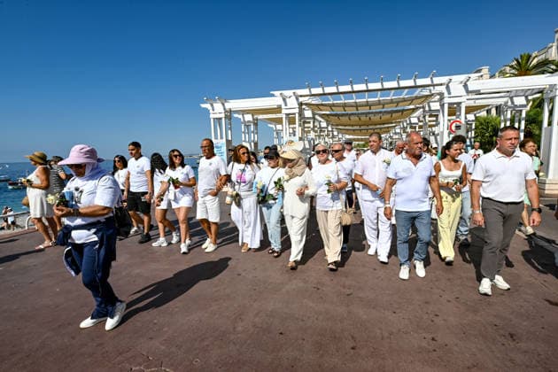 Commemorative White March in honor of the victims of the July 14, 2016, attack on the Promenade des Anglais in Nice, on July 12, 2026. The city of Nice and various victims’ associations organized a march, which began near Lenval Hospital, where the truck plowed into the crowd in 2016, killing 86 people and injuring more than 400. The procession stopped in front of the memorial sculpture *L’Ange de la Baie*, created by Jean Marie Fondacaro, for a wreath-laying ceremony before proceeding to the Albert I Garden, where everyone was able to place a white rose in front of the bandstand. The mayor of Nice, E. Ciotti, along with his partner O. Péraldi, the Prefect of the Alpes-Maritimes, L. Houttiaux, and members of his city council, such as Dep  Copyright: xBrunoxBebertx xBestimagexBrunoxBebertx xBestimagex