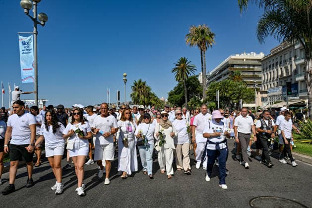 Commemorative White March in honor of the victims of the July 14, 2016, attack on the Promenade des Anglais in Nice, on July 12, 2026. The city of Nice and various victims’ associations organized a march, which began near Lenval Hospital, where the truck plowed into the crowd in 2016, killing 86 people and injuring more than 400. The procession stopped in front of the memorial sculpture *L’Ange de la Baie*, created by Jean Marie Fondacaro, for a wreath-laying ceremony before proceeding to the Albert I Garden, where everyone was able to place a white rose in front of the bandstand. The mayor of Nice, E. Ciotti, along with his partner O. Péraldi, the Prefect of the Alpes-Maritimes, L. Houttiaux, and members of his city council, such as Dep  Copyright: xBrunoxBebertx xBestimagexBrunoxBebertx xBestimagex