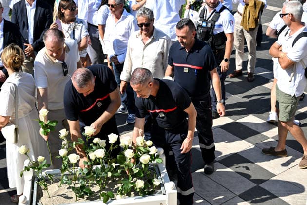 Commemorative White March in honor of the victims of the July 14, 2016, attack on the Promenade des Anglais in Nice, on July 12, 2026. The city of Nice and various victims’ organizations organized a march, which began near Lenval Hospital, where the truck plowed into the crowd in 2016, killing 86 people and injuring more than 400. The procession stopped in front of the memorial sculpture *L’Ange de la Baie*, created by Jean Marie Fondacaro, for a wreath-laying ceremony before proceeding to the Albert I Garden, where everyone could place a white rose in front of the bandstand. The mayor of Nice, E. Ciotti, along with his partner O. Péraldi, the Prefect of the Alpes-Maritimes, L. Houttiaux, and members of his city council, such as Deputy B  Copyright: xBrunoxBebertx xBestimagexBrunoxBebertx xBestimagex