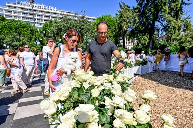 Commemorative White March in honor of the victims of the July 14, 2016, attack on the Promenade des Anglais in Nice, on July 12, 2026. The city of Nice and various victims’ organizations organized a march, which began near Lenval Hospital, where the truck plowed into the crowd in 2016, killing 86 people and injuring more than 400. The procession stopped in front of the memorial sculpture *L’Ange de la Baie*, created by Jean Marie Fondacaro, for a wreath-laying ceremony before proceeding to the Albert I Garden, where everyone could place a white rose in front of the bandstand. The mayor of Nice, E. Ciotti, along with his partner O. Péraldi, the Prefect of the Alpes-Maritimes, L. Houttiaux, and members of his city council, such as Deputy B  Copyright: xBrunoxBebertx xBestimagexBrunoxBebertx xBestimagex