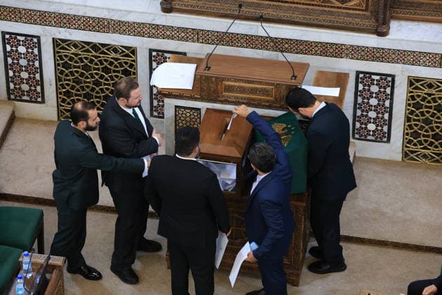 Syrian Parliament Members Vote for New Speaker in the Presence of President Ahmed al-Sharaa Damascus, Syria - July 12, 2026: Members of Syria s newly formed People s Assembly cast their votes to elect the speaker of the parliament during the historic inaugural session held in the presence of Syrian President Ahmed al-Sharaa for the first time since the fall of the Bashar al-Assad regime. Damascus Syria Copyright: xMohammadxBashirxAldaherx