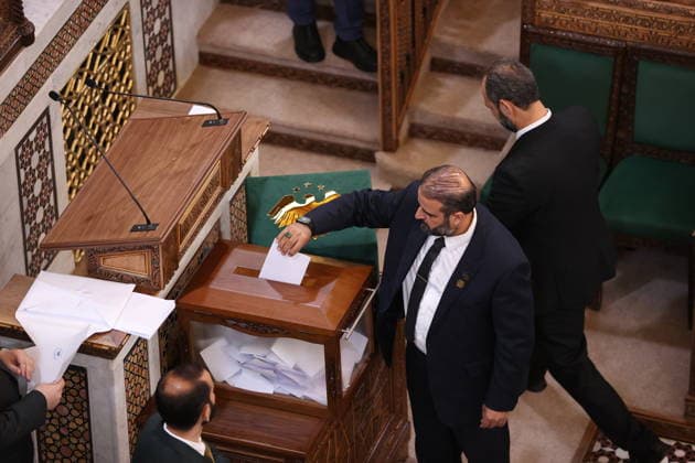 Sharaa calls for new chapter in Syria s history as new parliament convenes DAMASCUS, SYRIA - JULY 12: Syrian legislators cast their votes during the first session of the newly formed People s Assembly at the parliament building following the fall of the Assad regime, in Damascus, Syria, on July 12, 2026. Izz Aldien Alqasem Anadolu Damascus Syria. Editorial use only. Please get in touch for any other usage.  Copyright: x2026xAnadoluxIzzxAldienxAlqasemx