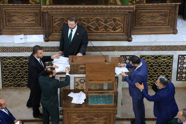 Syrian Parliament Members Vote for New Speaker in the Presence of President Ahmed al-Sharaa Damascus, Syria - July 12, 2026: Members of Syria s newly formed People s Assembly cast their votes to elect the speaker of the parliament during the historic inaugural session held in the presence of Syrian President Ahmed al-Sharaa for the first time since the fall of the Bashar al-Assad regime. Damascus Syria Copyright: xMohammadxBashirxAldaherx