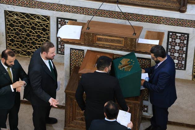 Syrian Parliament Members Vote for New Speaker in the Presence of President Ahmed al-Sharaa Damascus, Syria - July 12, 2026: Members of Syria s newly formed People s Assembly cast their votes to elect the speaker of the parliament during the historic inaugural session held in the presence of Syrian President Ahmed al-Sharaa for the first time since the fall of the Bashar al-Assad regime. Damascus Syria Copyright: xMohammadxBashirxAldaherx