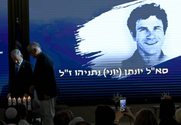 Israeli Prime Minister Benjamin Netanyahu speaks at a ceremony marking 50 years since Operation Entebbe, Operation Yonathan, at the president s residence in Jerusalem on Sunday, July 12, 2026. Netanyahu s oldest brother Yonathan was killed in the legendary 1976 Israeli counter-terrorist hostage rescue mission in Uganda.  JER2026071205 DEBBIExHILL